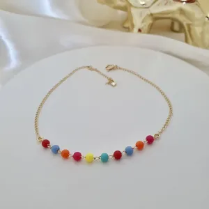 Tornozeleira com bolinhas coloridas
