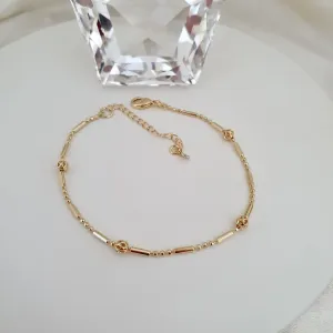 Pulseira esferas, tubos e bolinhas