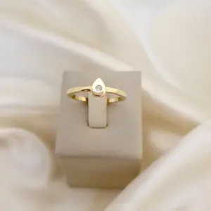 Anel gota com ponto de luz de zirconia