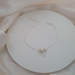 Pulseira prata 2 pérolas e ponto de luz zirconia