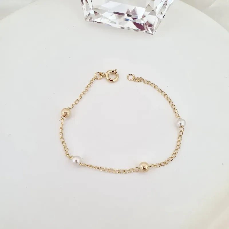 Pulseira infantil bolinhas e pérolas