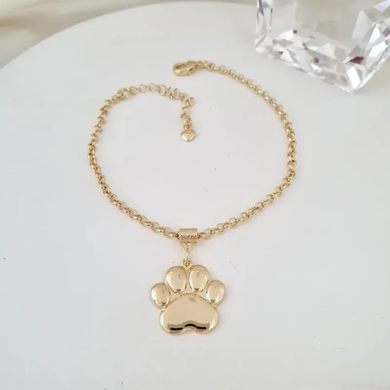 Pulseira elo português e pingente de patinha