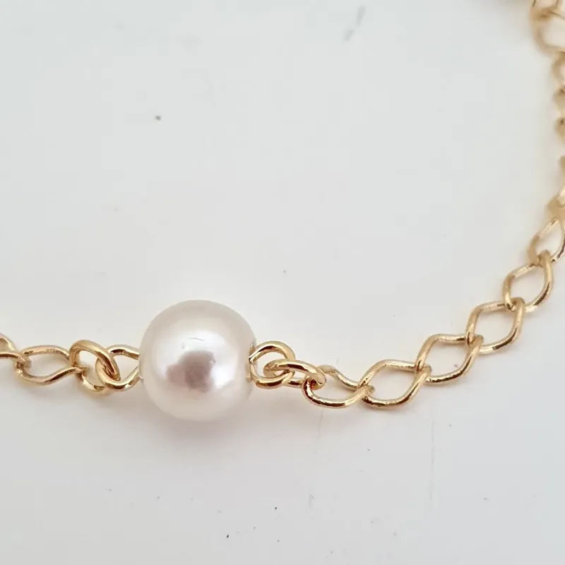 Pulseira com pérolas 5mm