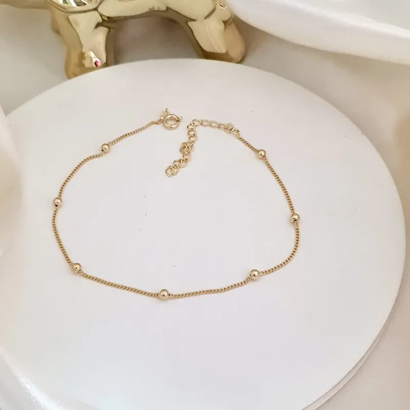 Tornozeleira com bolinhas