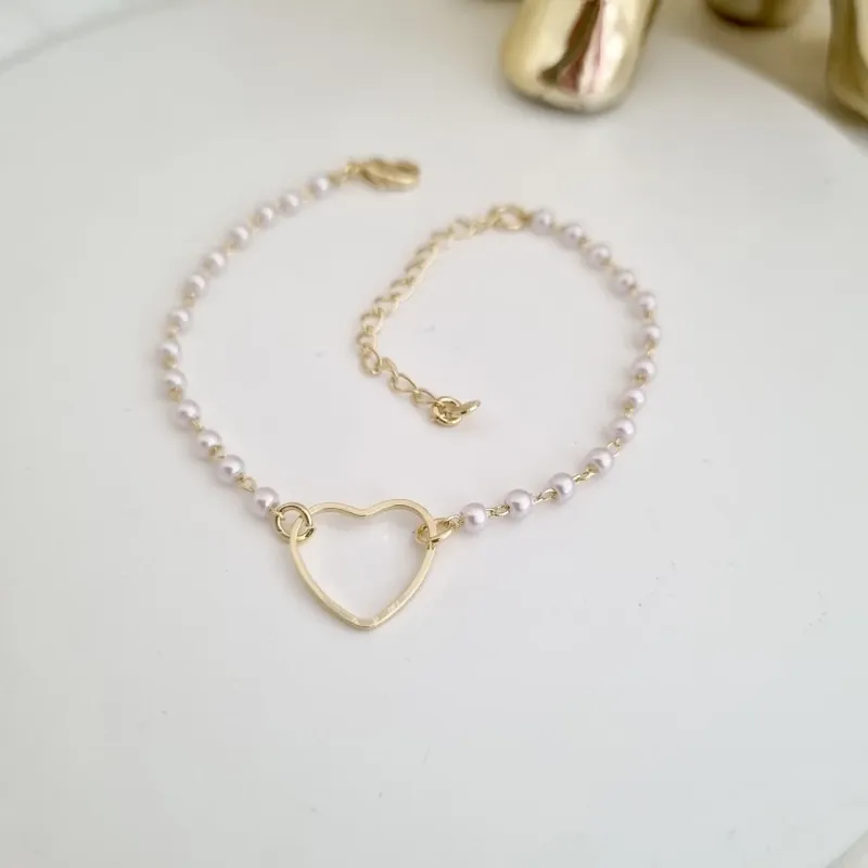 Pulseira pérolas e coração