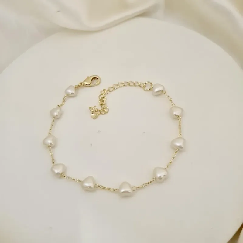 Pulseira perolas coracao