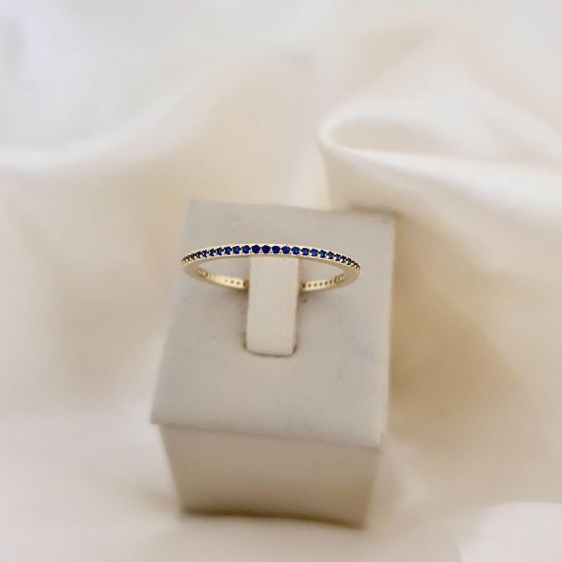 Anel aparador zirconia azul
