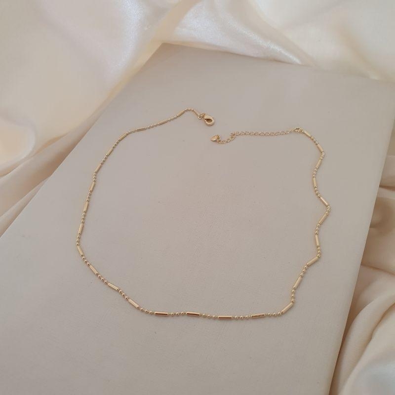 Colar choker tubo e bolinha