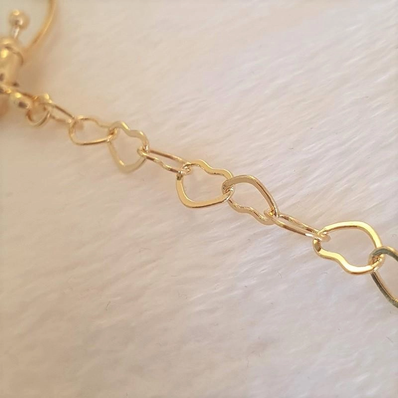 Colar com fechamento de coração e fecho boia