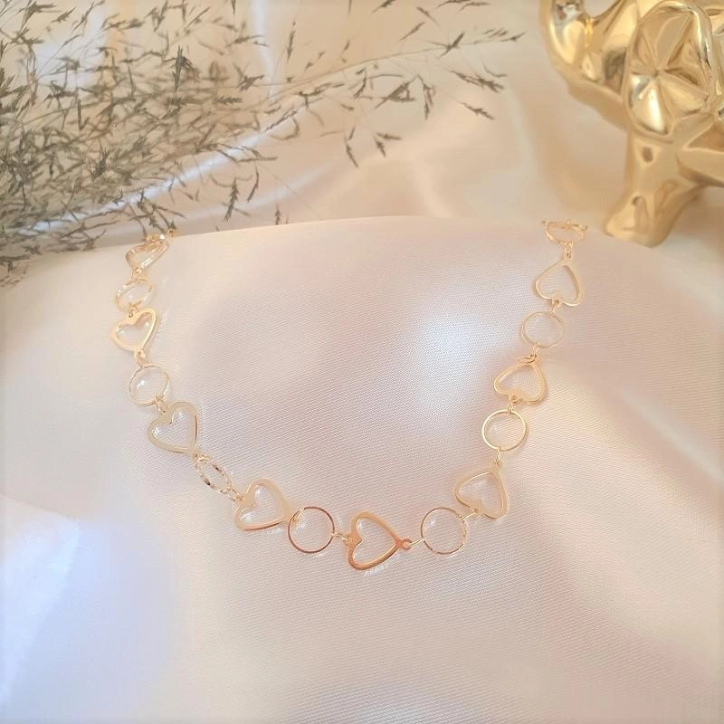 Choker coração e círculo diamantado