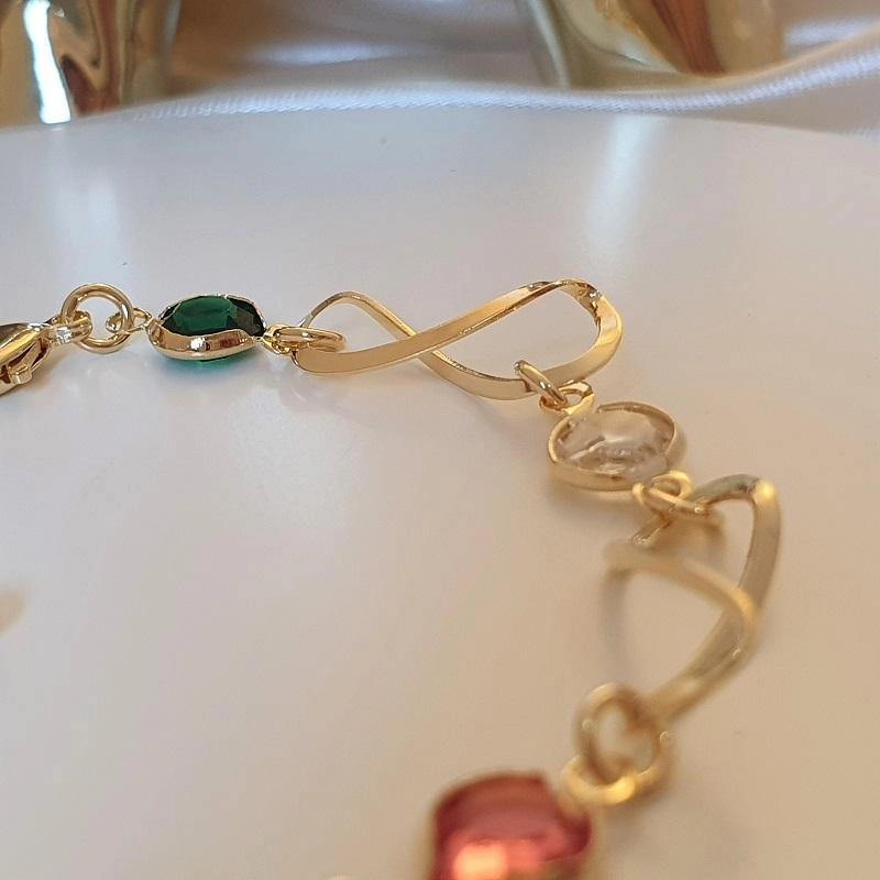 Pulseira elo infinito e cristais coloridos