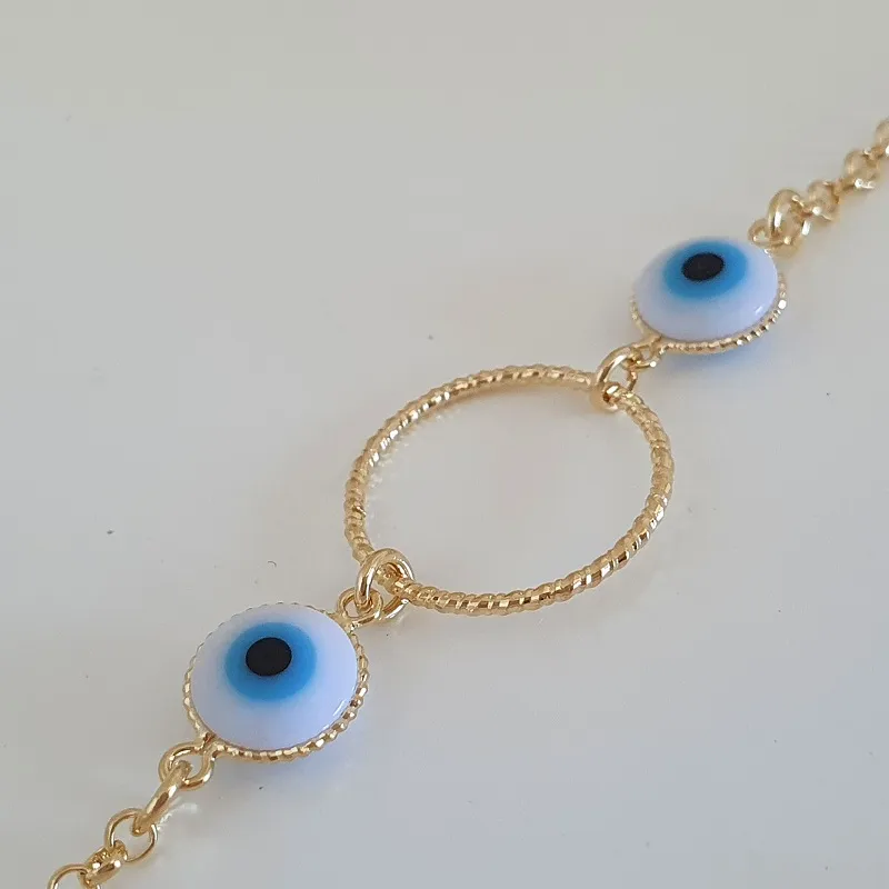 Pulseira círculo diamantado e olho grego