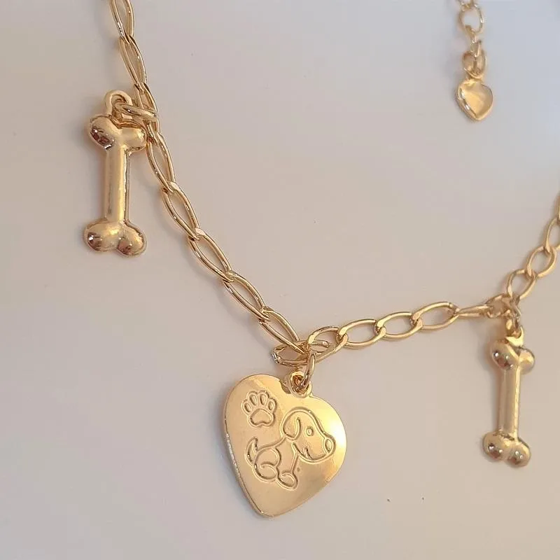 Pulseira cachorro e osso