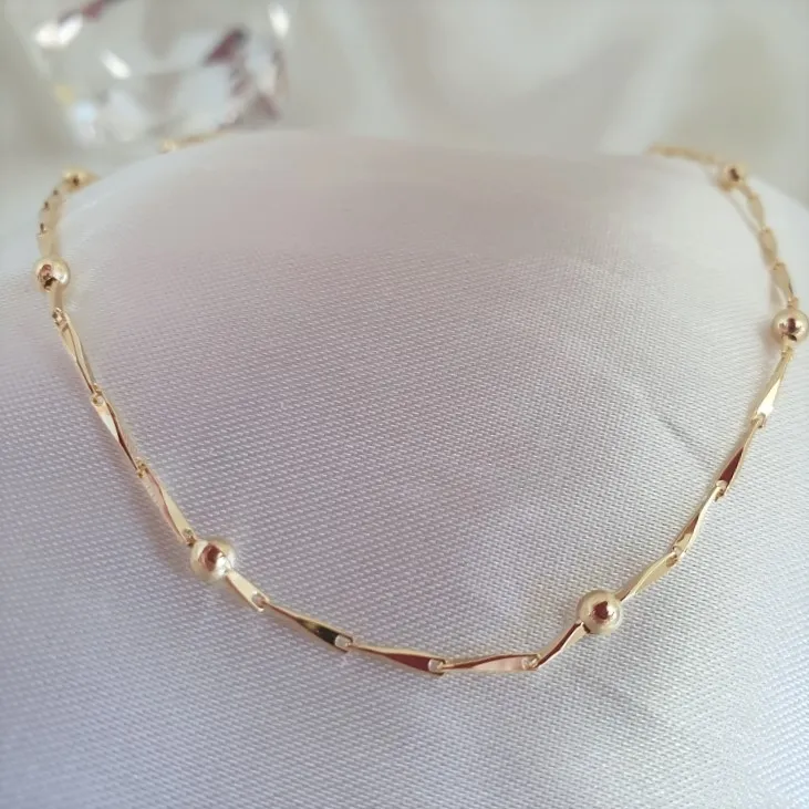 Choker com bolinhas e elos trabalhados