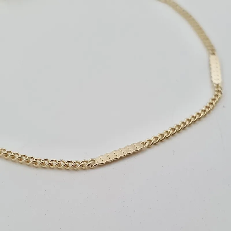 Tornozeleira com detalhe achatado