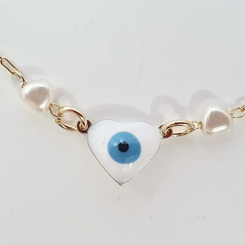Pulseira com coração olho grego e corações pérola