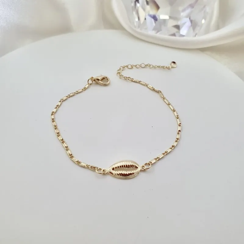 Pulseira com concha búzios