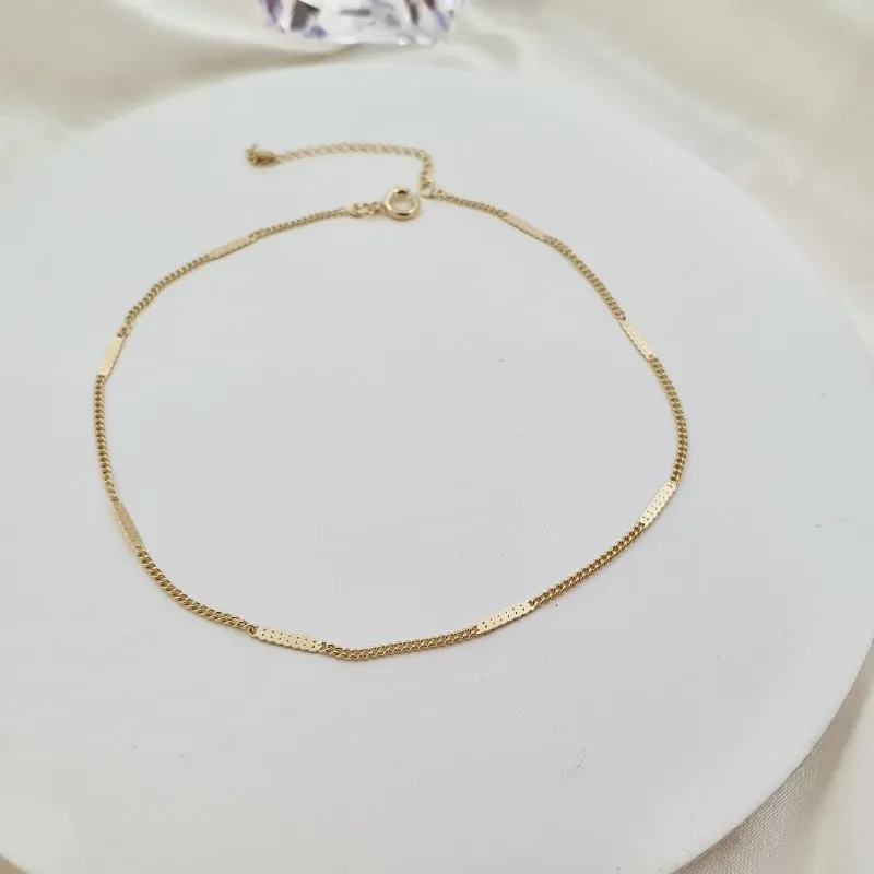 Tornozeleira com detalhe achatado