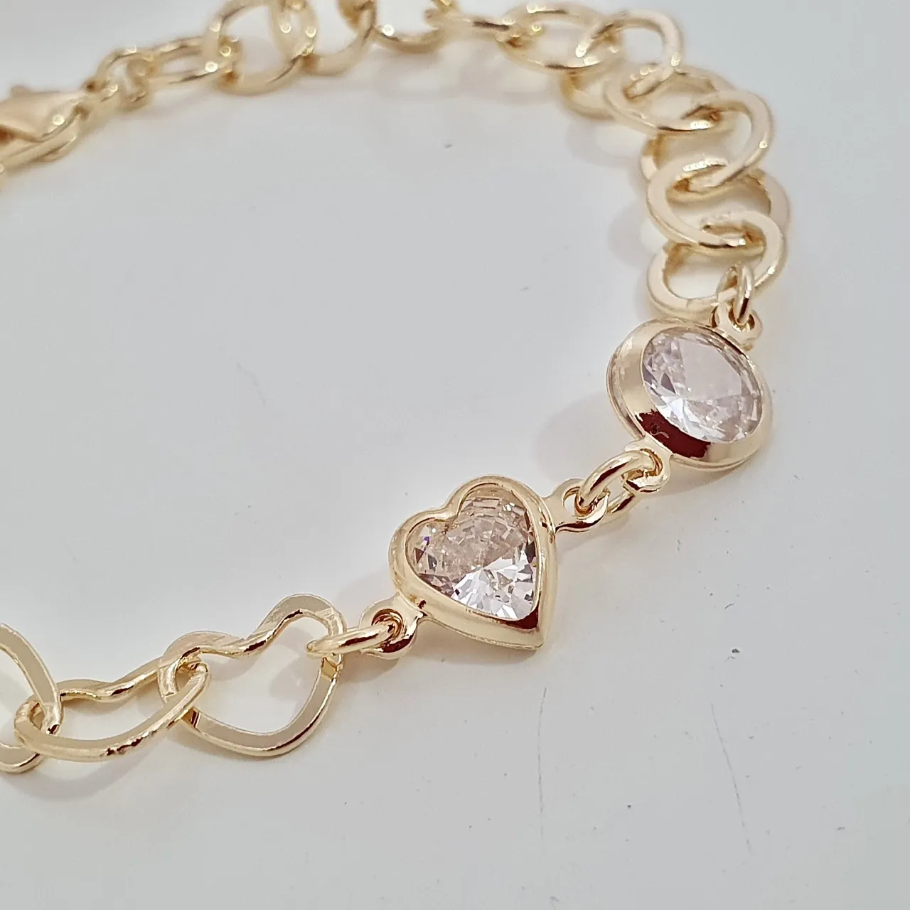 Pulseira grossa coração e pontos de luz