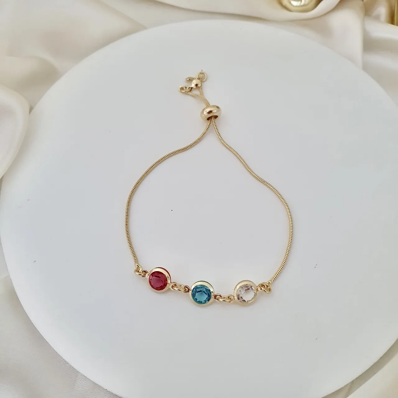 Pulseira gravatinha pontos de luz coloridos