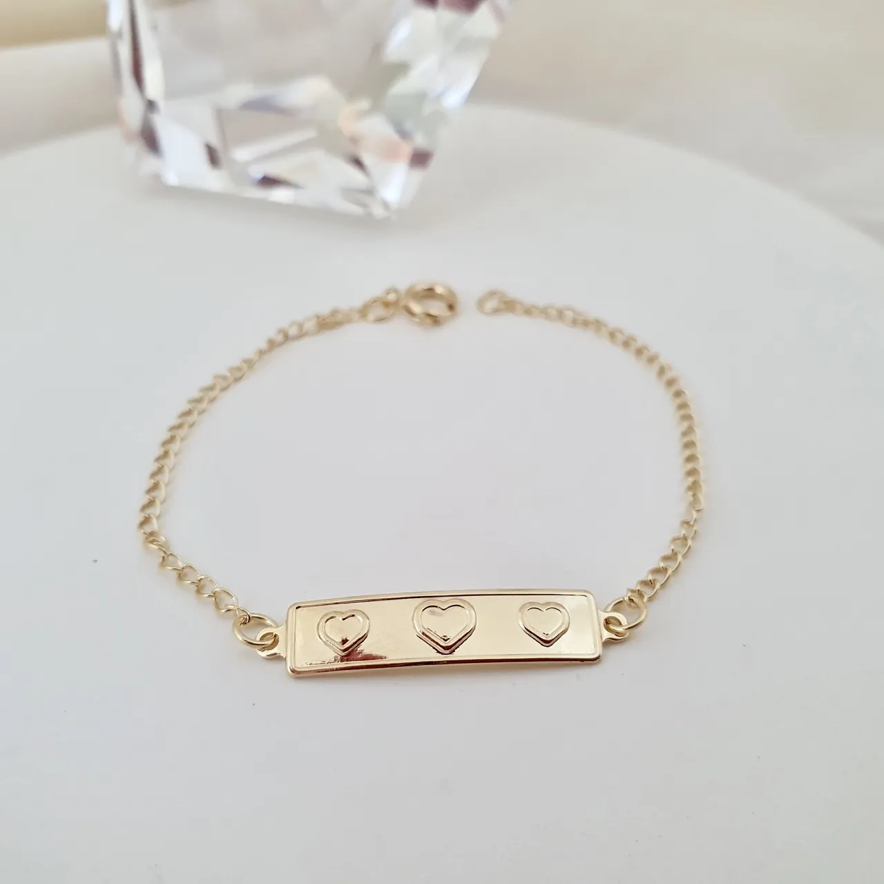 Pulseira infantil placa 3 corações