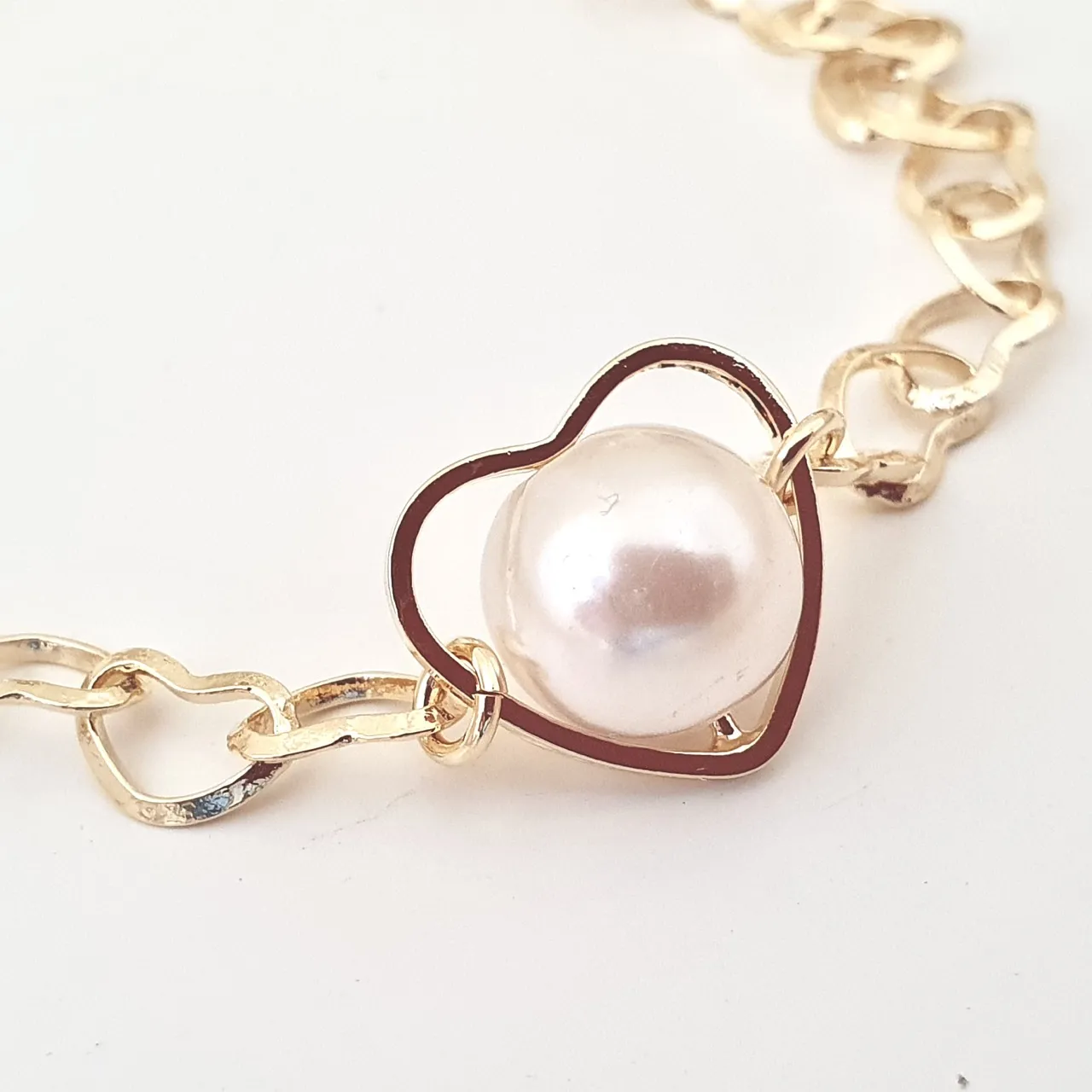 Pulseira coração com pérola