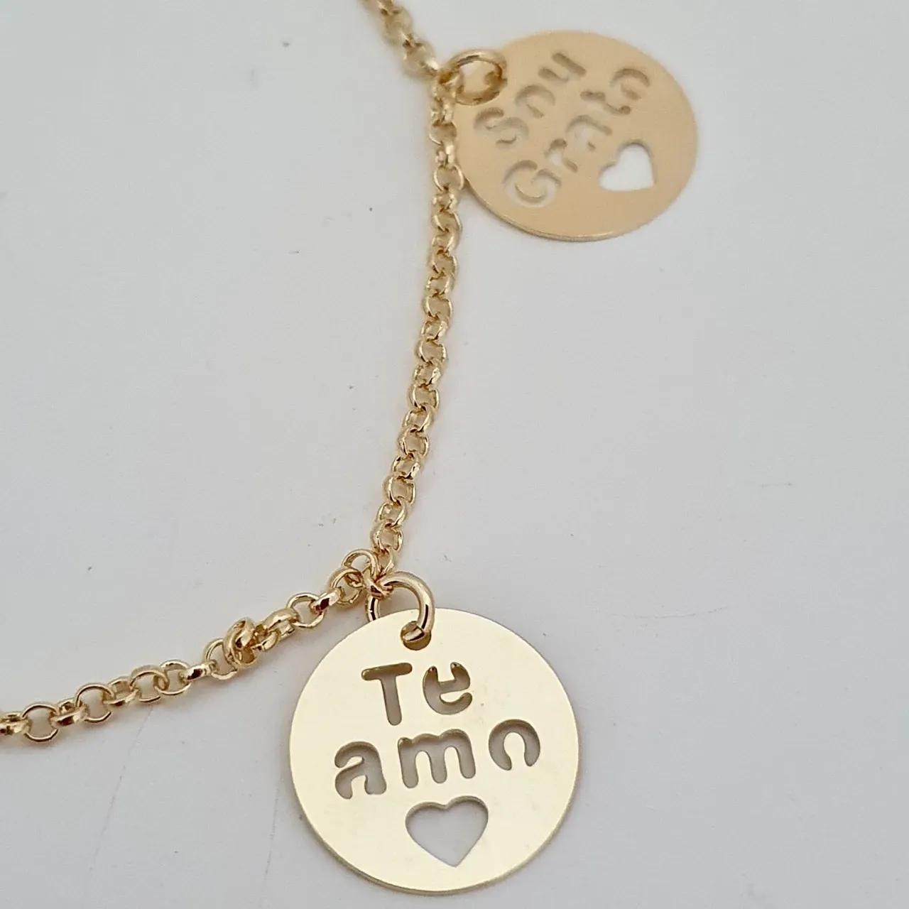 Pulseira com medalhas ho'oponopono