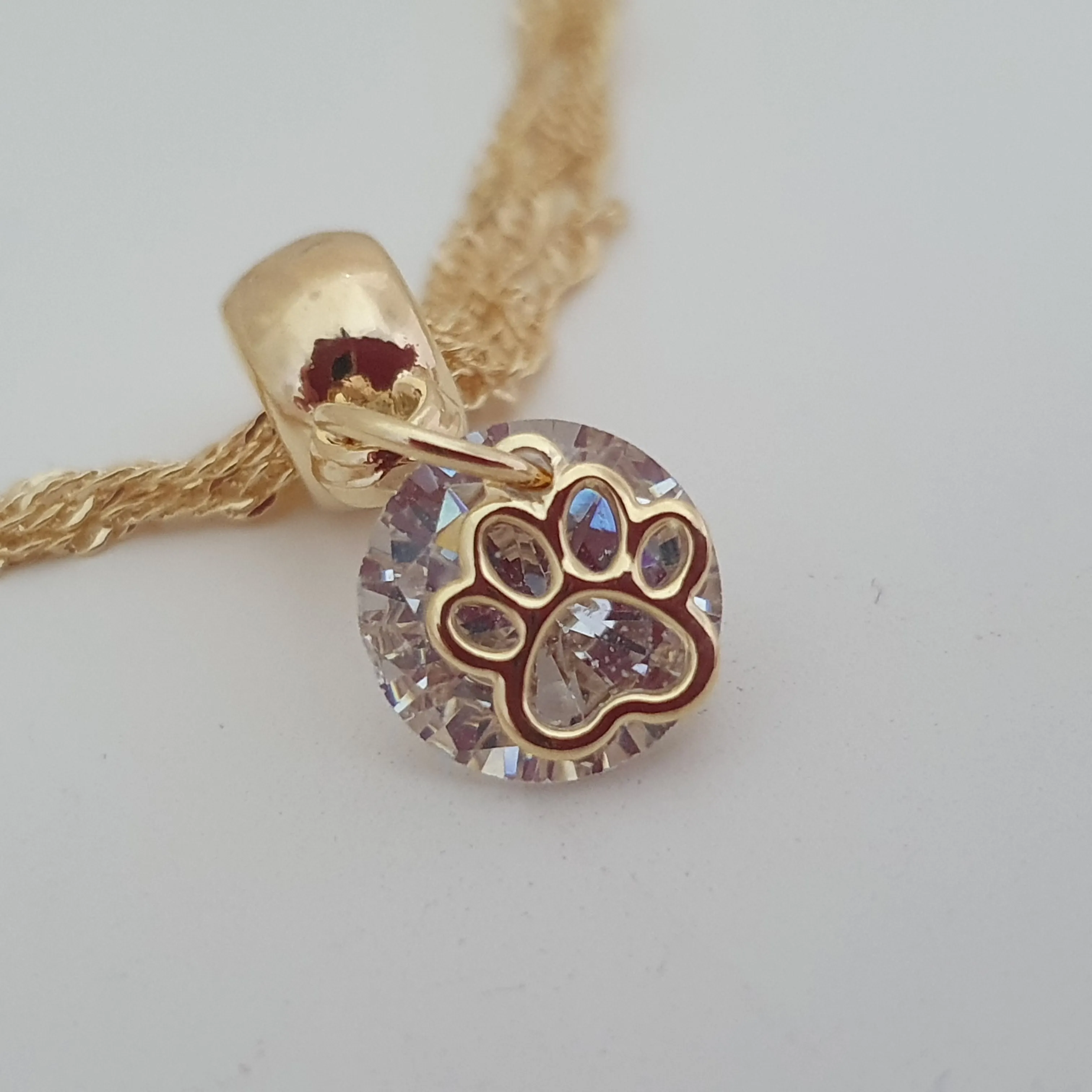 Pulseira tripla com zircônia 10mm e patinha pet