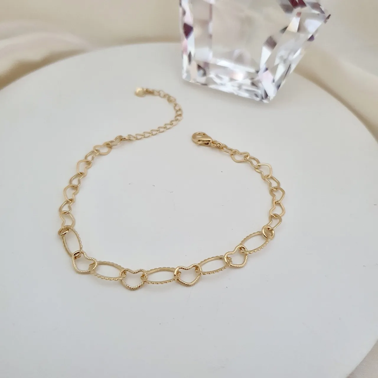 Pulseira com elos de coração e ovais