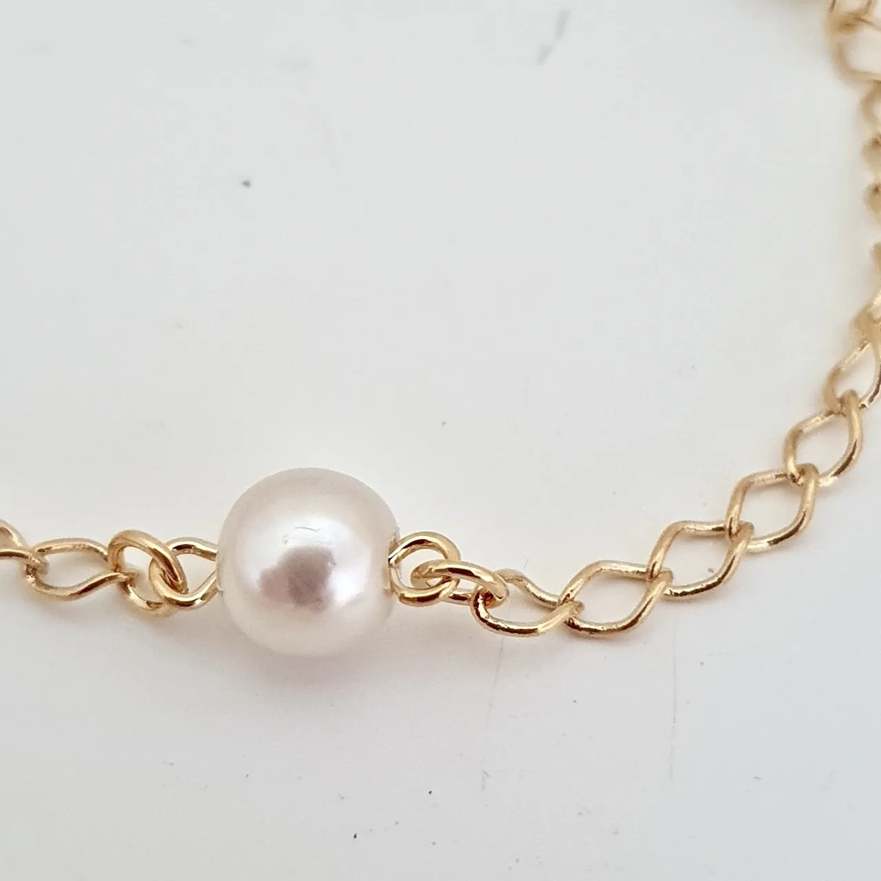 Pulseira com pérolas 5mm