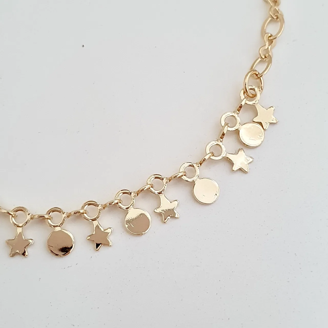 Pulseira estrela e bolinhas