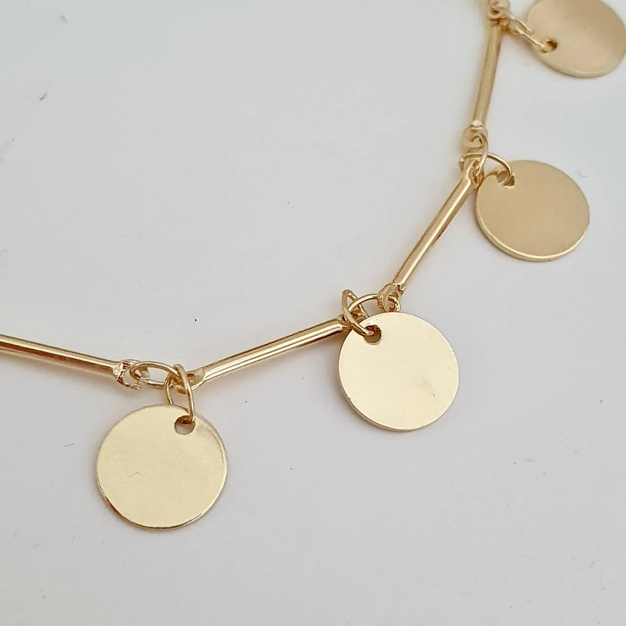 Pulseira gravatinha com medalhas