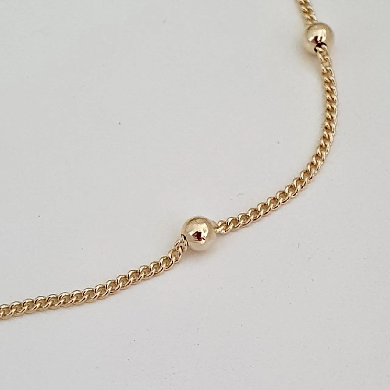 Tornozeleira com bolinhas