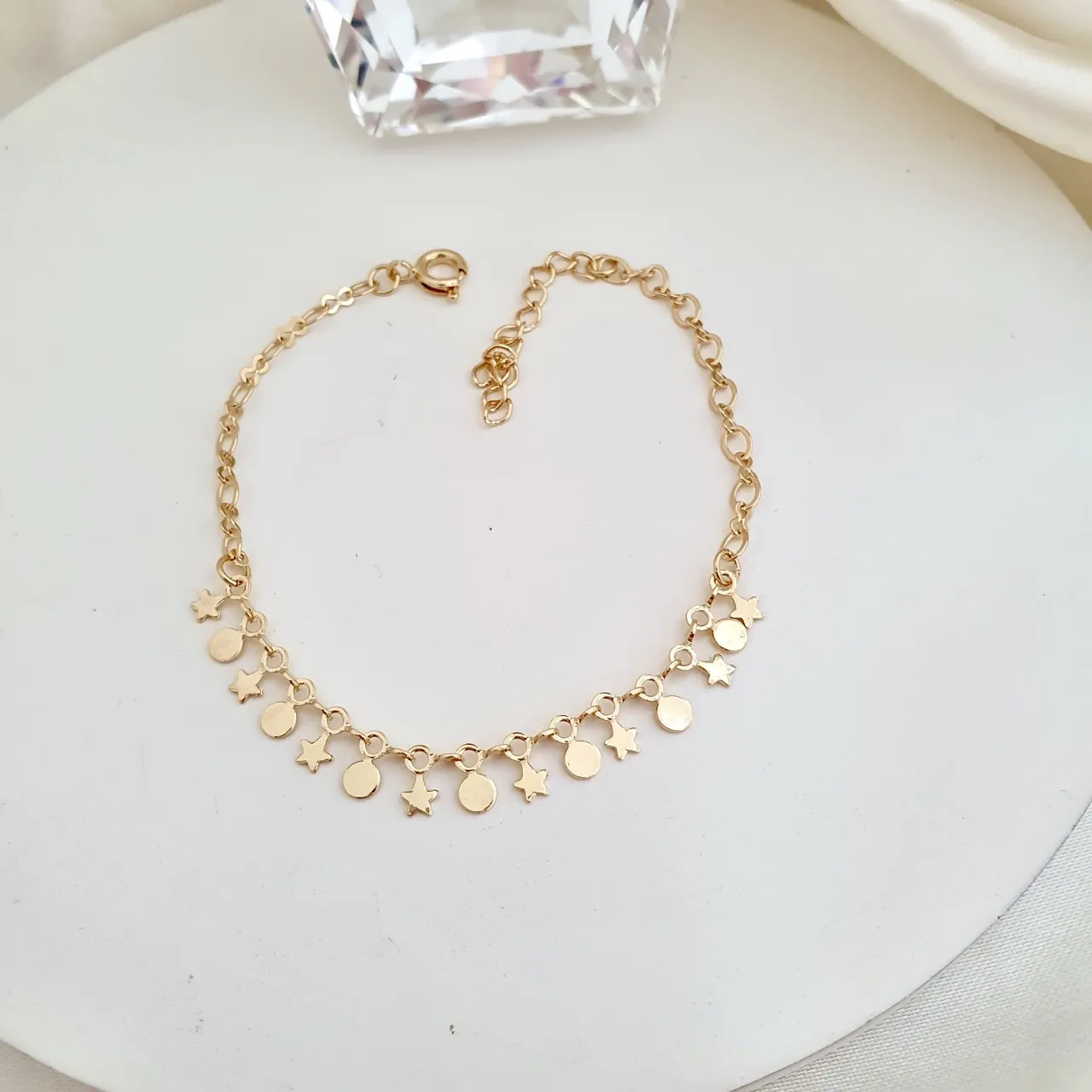 Pulseira estrela e bolinhas