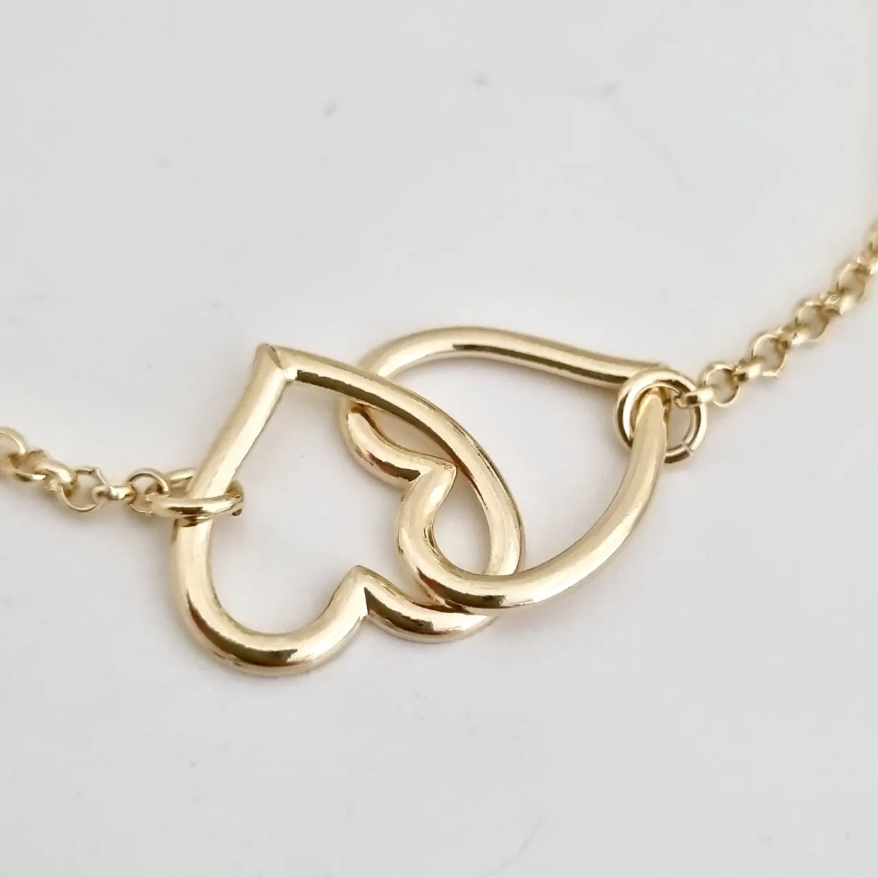 Pulseira 2 corações entrelaçados