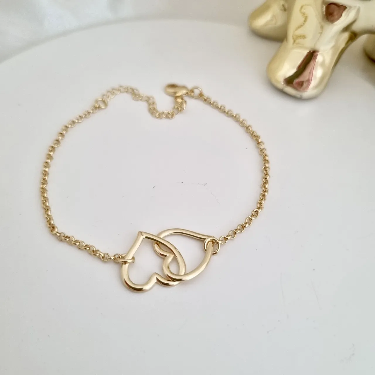 Pulseira 2 corações entrelaçados