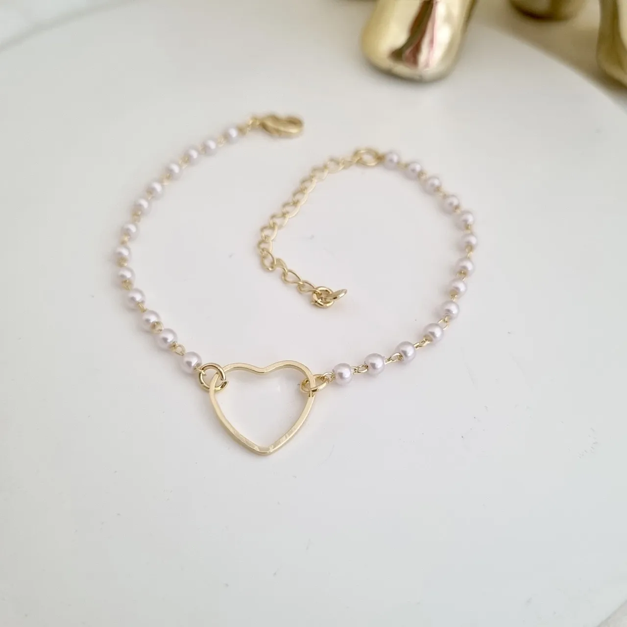 Pulseira pérolas e coração