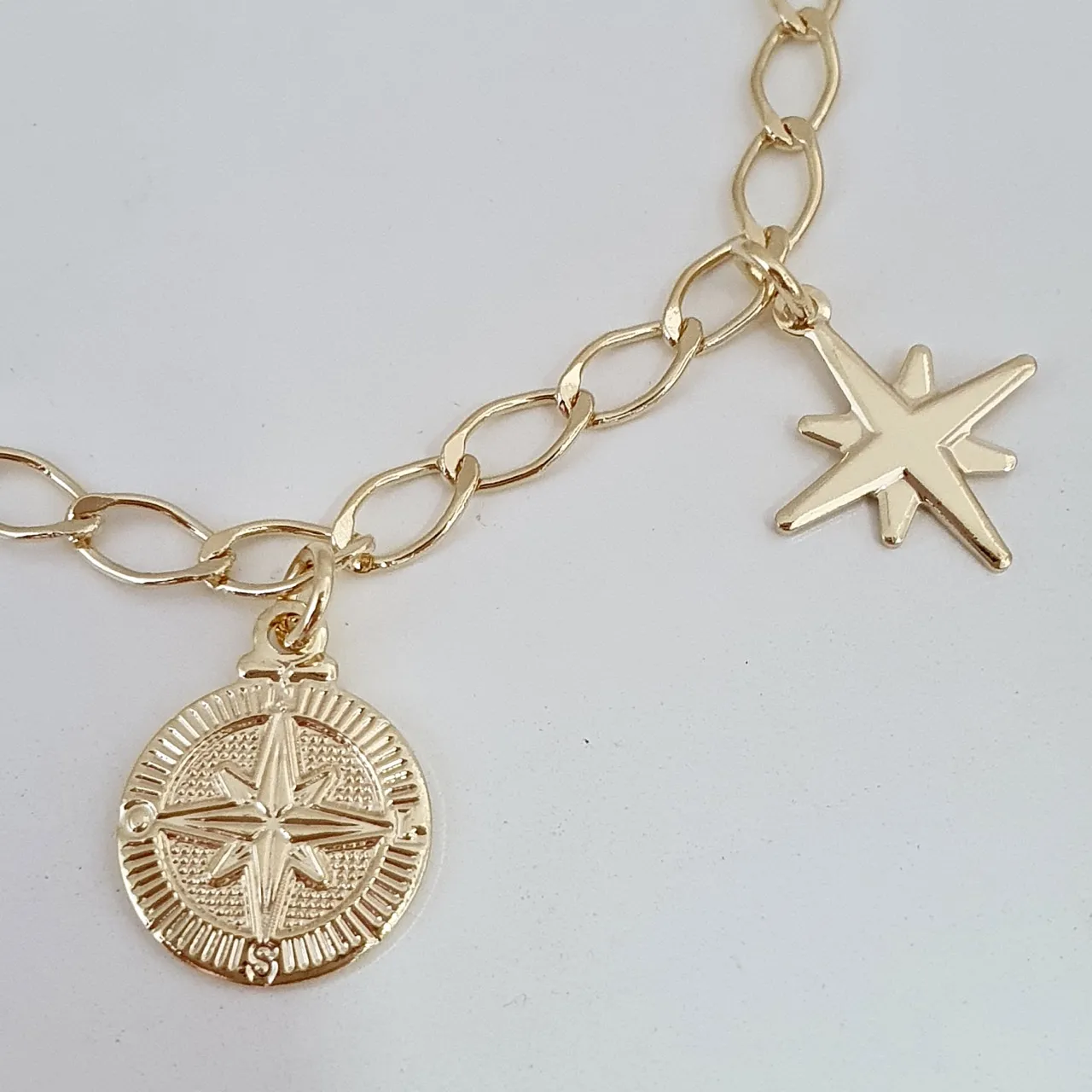 Pulseira rosa dos ventos
