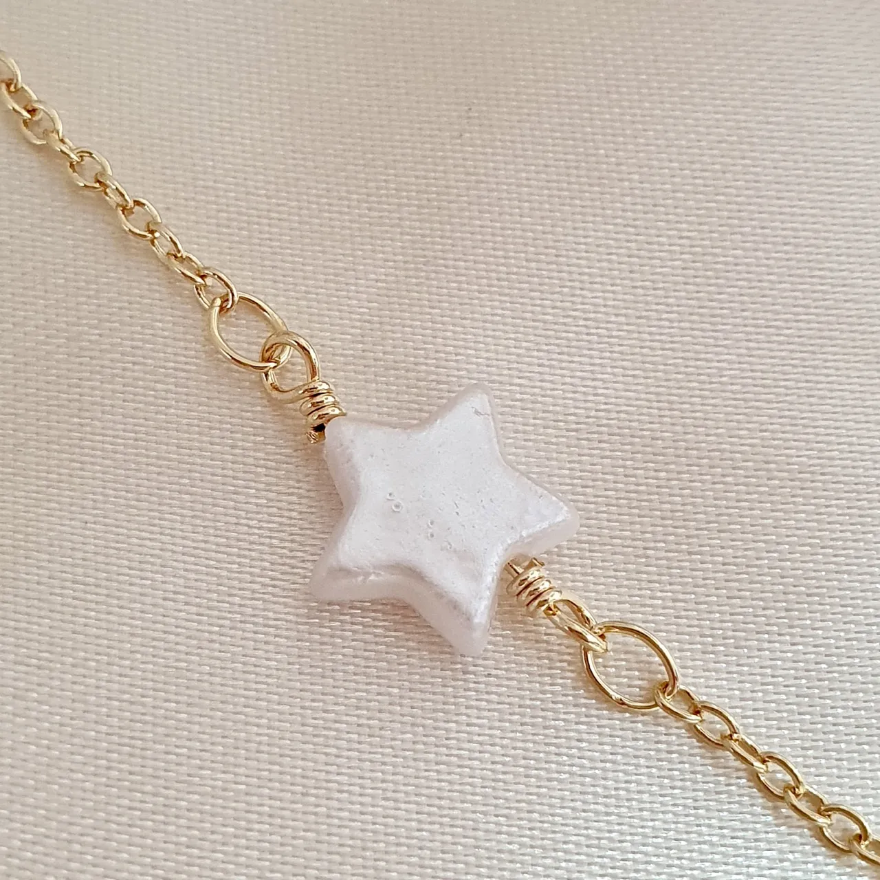 Pulseira estrela perolada