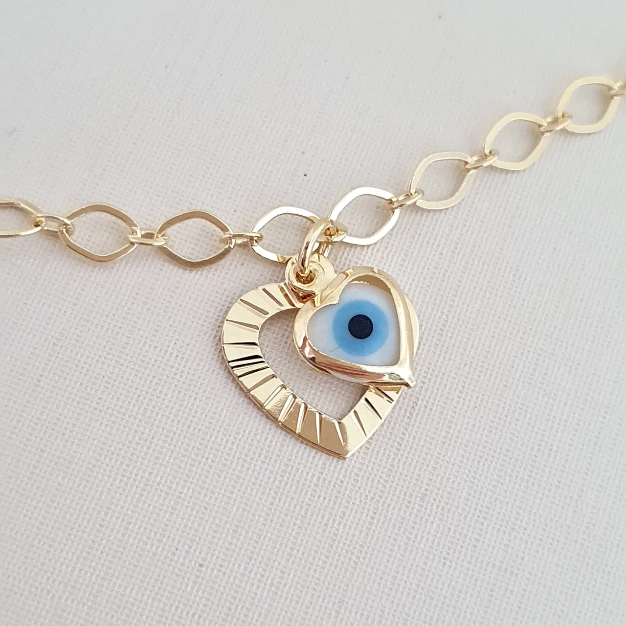 Choker coração e olho grego