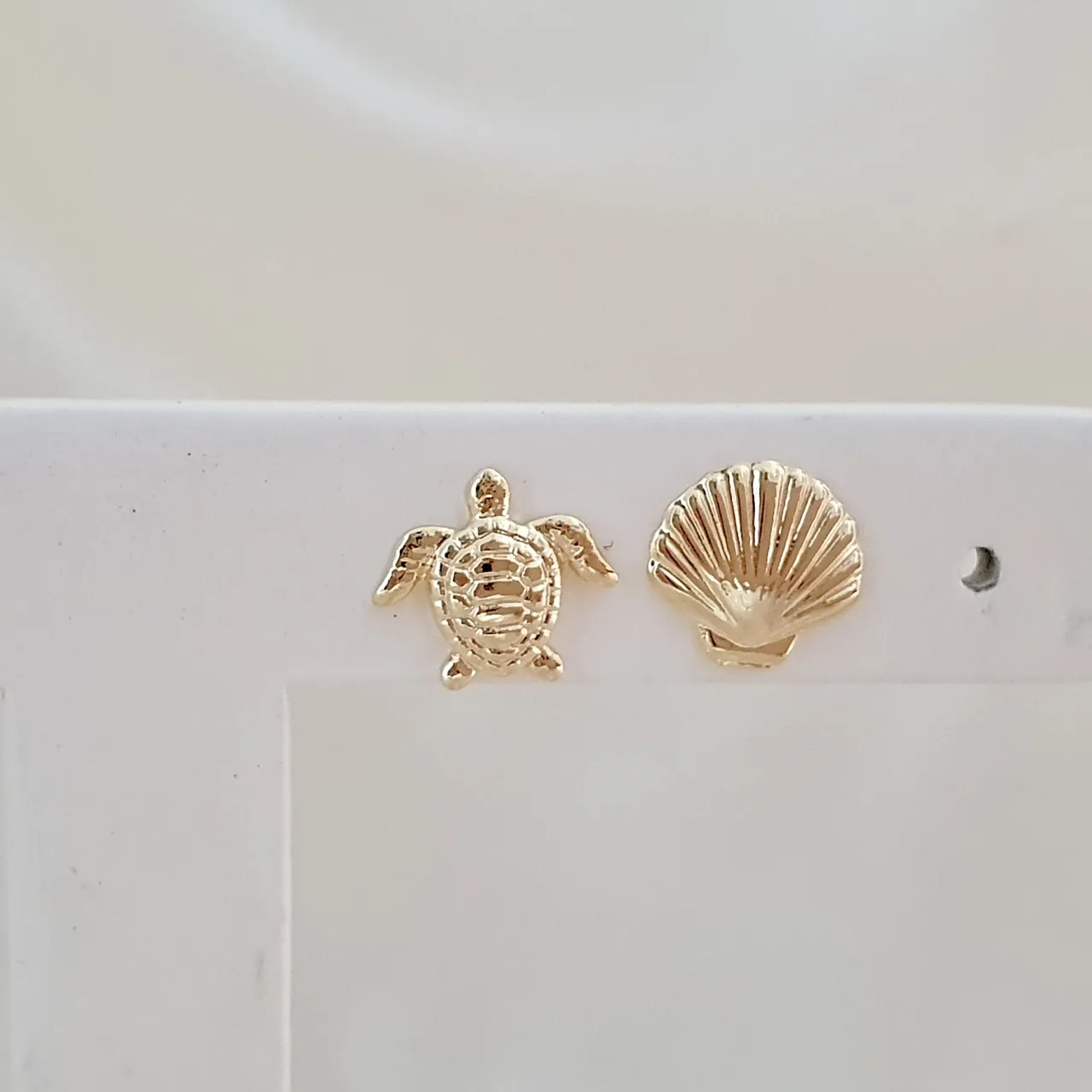 Brinco dupla concha e tartaruga