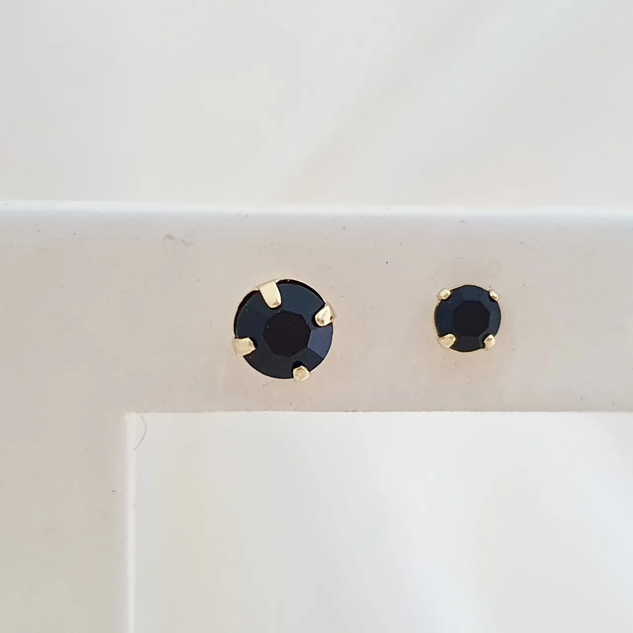 Brinco dupla ponto de luz preto