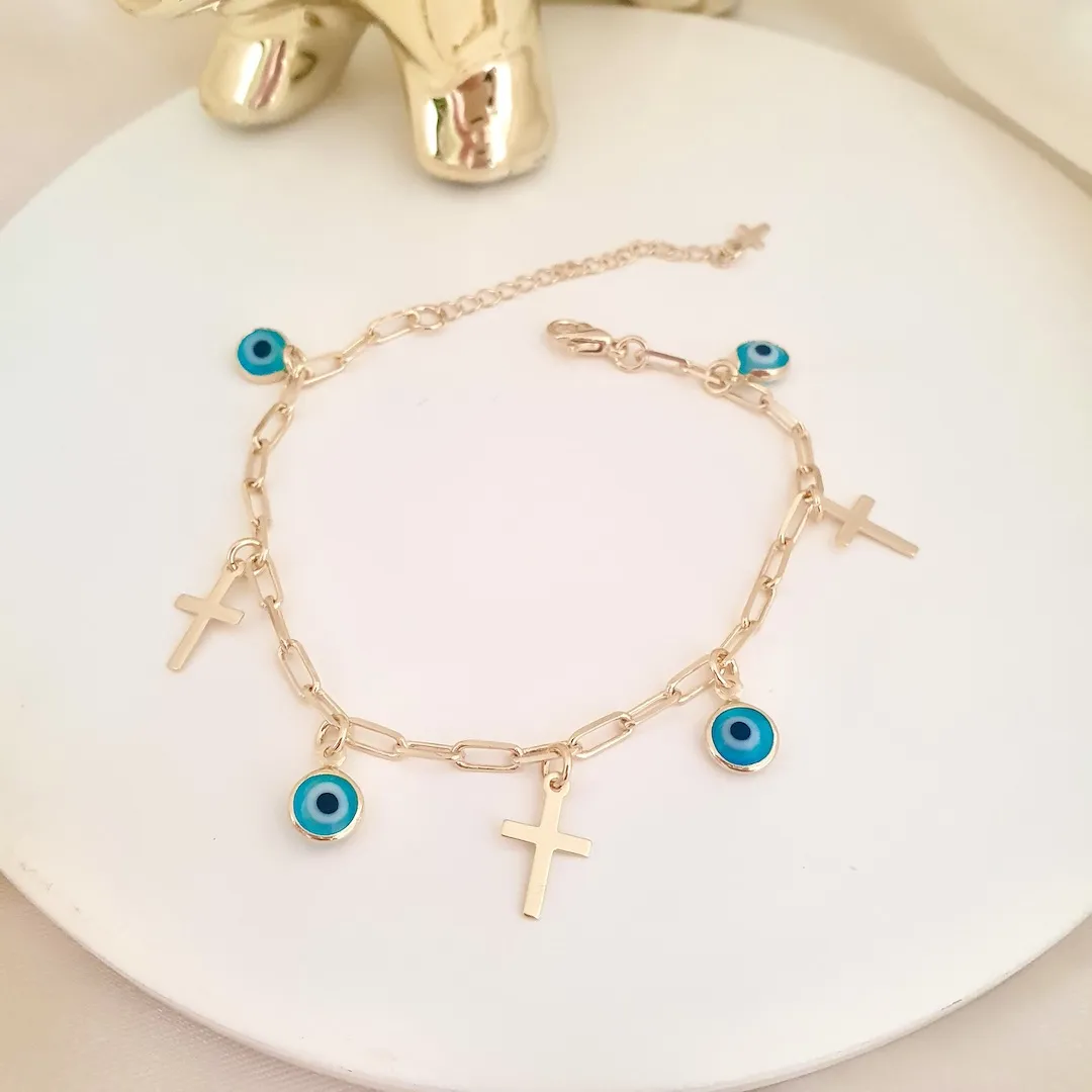 Pulseira cruz e olho grego