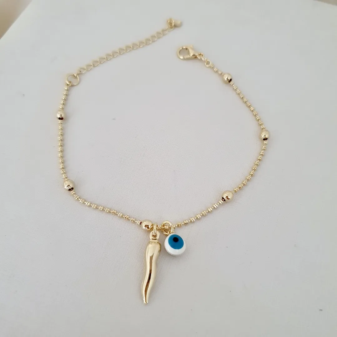 Pulseira bolinhas olho grego e pimenta