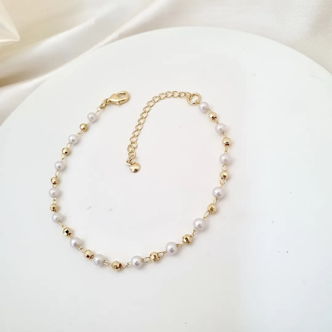 Pulseira pérola e bola diamantada