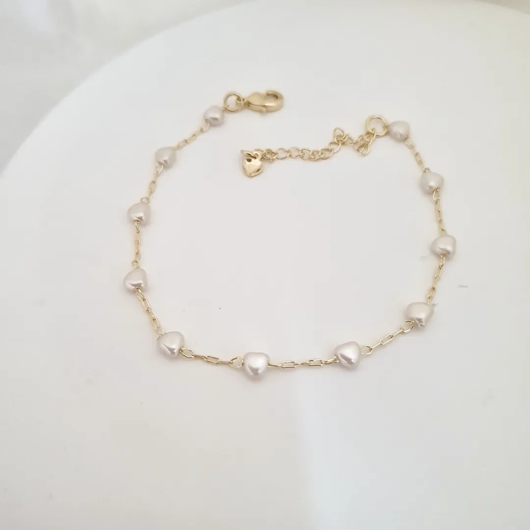Pulseira pérola em formato de coração