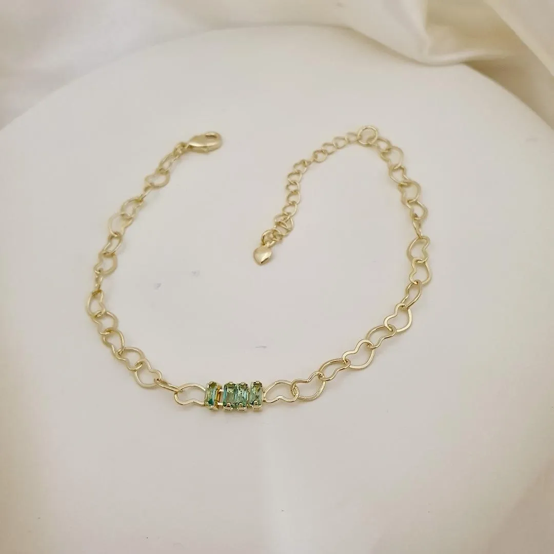 Pulseira elo coraçao 4 zirconias verdes