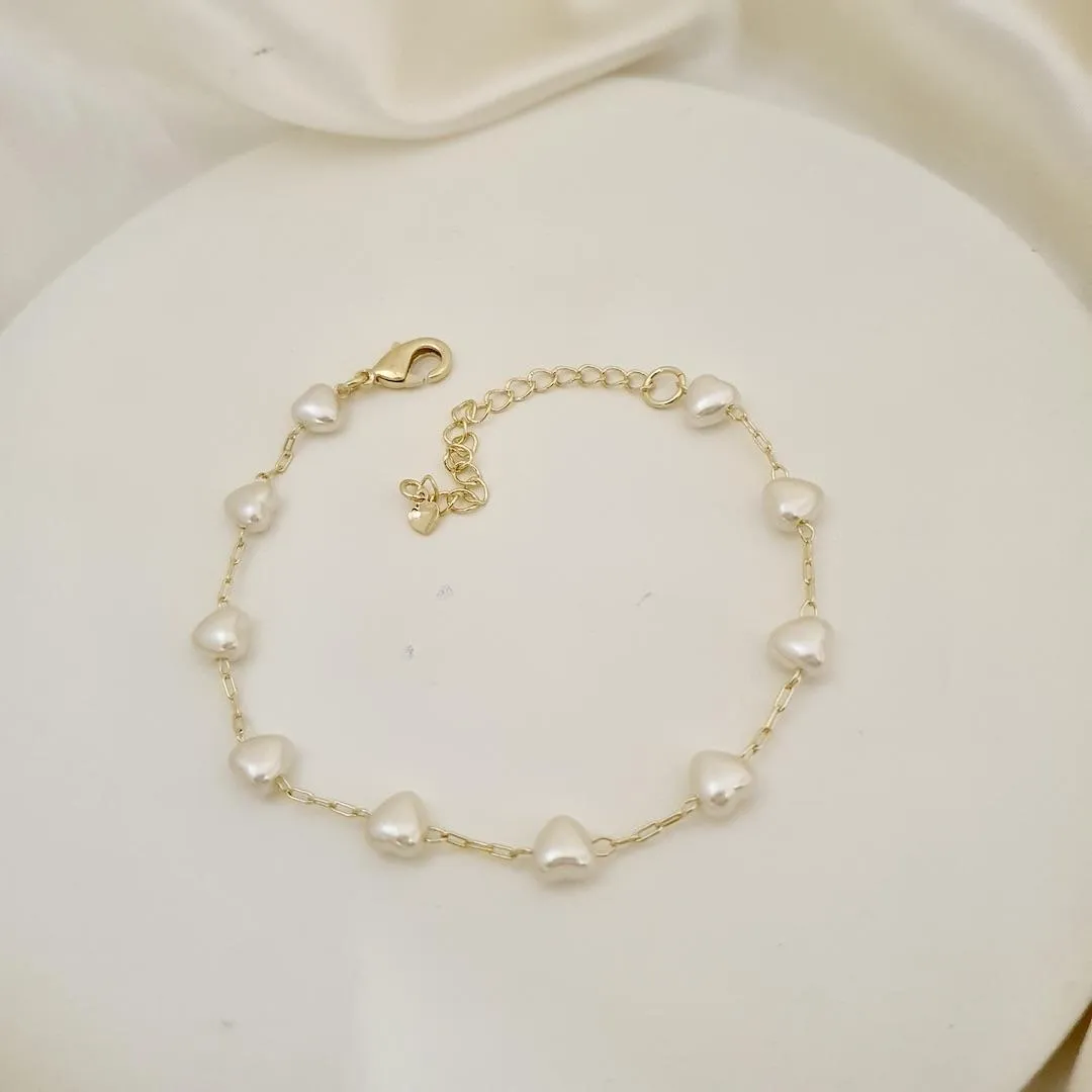 Pulseira perolas coracao