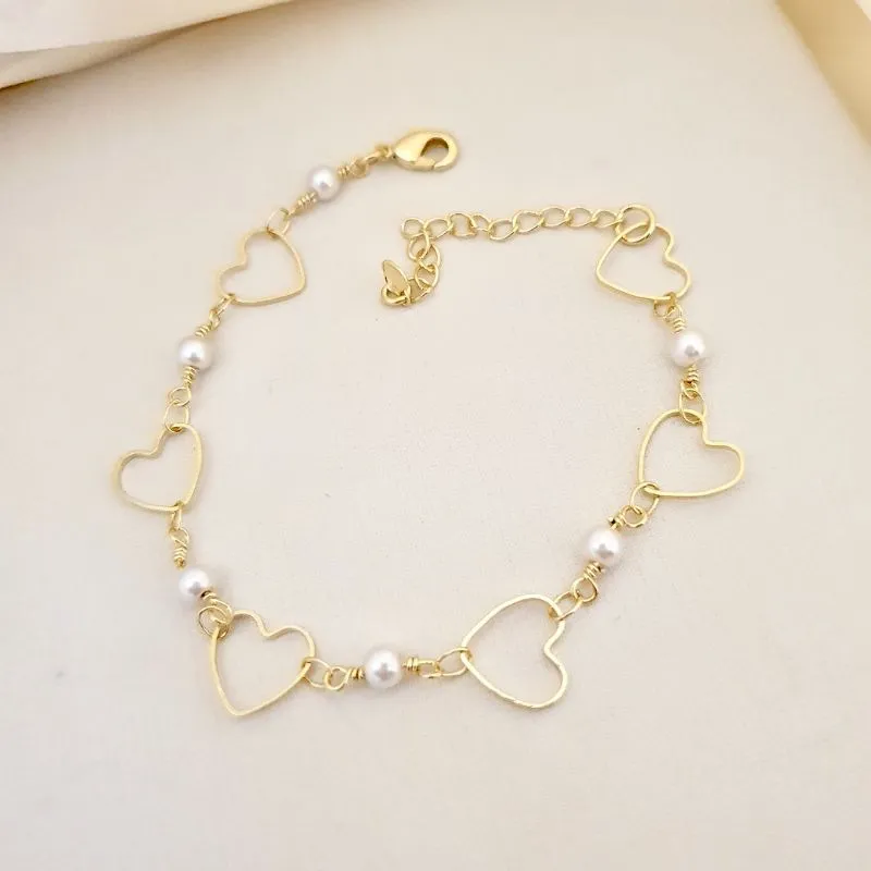 Pulseira de corações e perolas