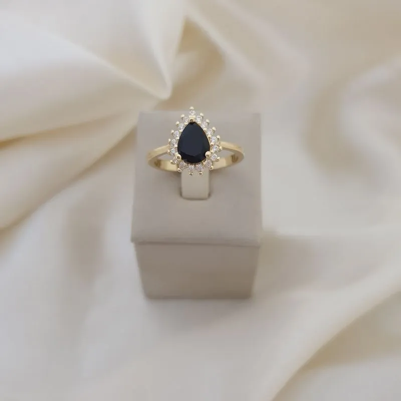 Anel gota zirconia preta, contorno microzirconias cor cristal